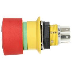 Eine Seitenansicht eines Stapels elektrischer Komponenten: rote Kappe, grüner Mittelteil und gelbe Basis mit silbernen Stiften.