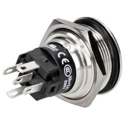 Ein kreisförmiger metallischer Druckschalter mit drei elektrischen Stiften, der zur Steuerung elektronischer Geräte verwendet wird, von der Seite betrachtet.