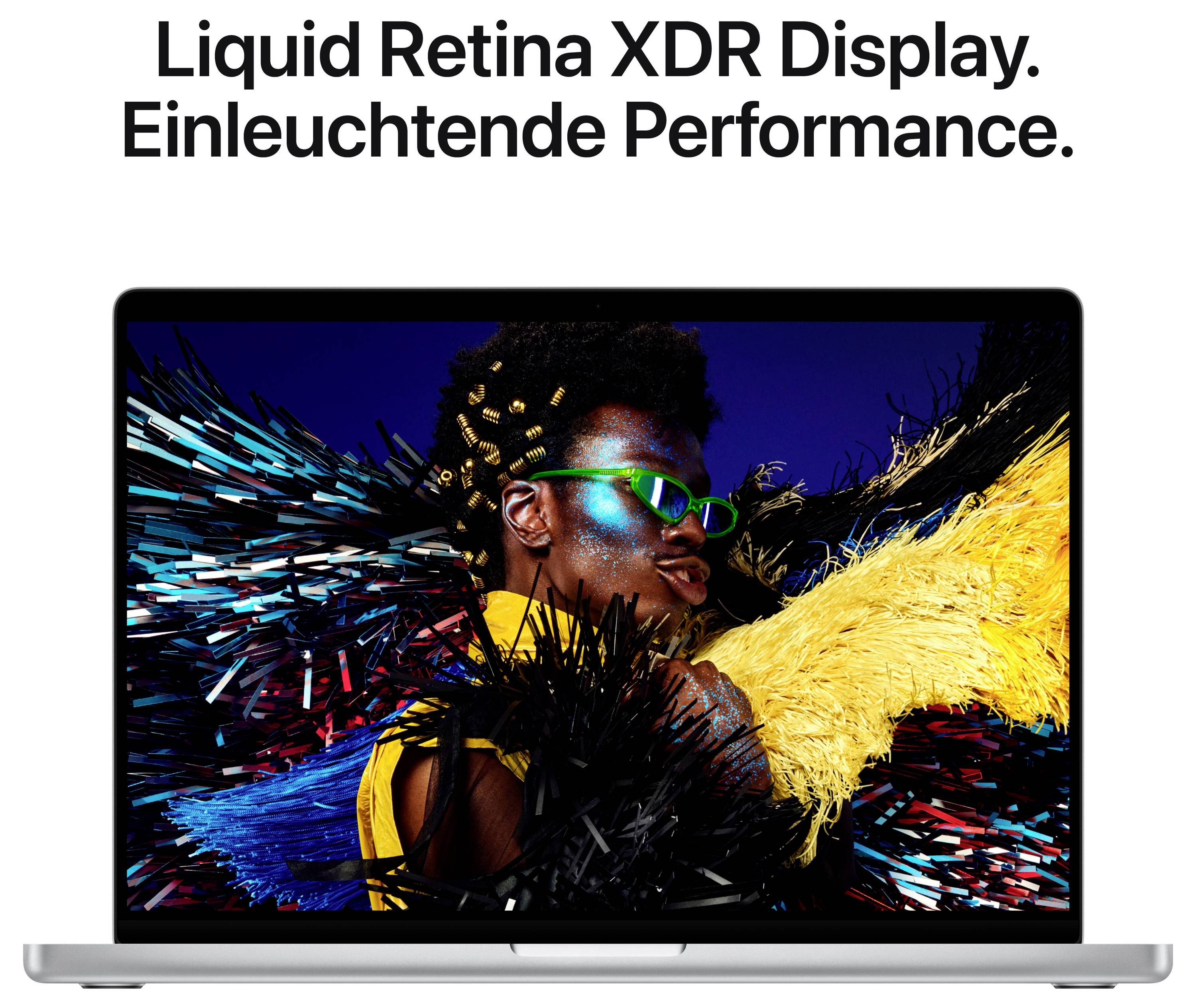 Ein Mann in leuchtend buntem Outfit vor schwarzem Hintergrund auf einem Laptopbildschirm. Text: 'Liquid Retina XDR Display. Einleuchtende Performance.'