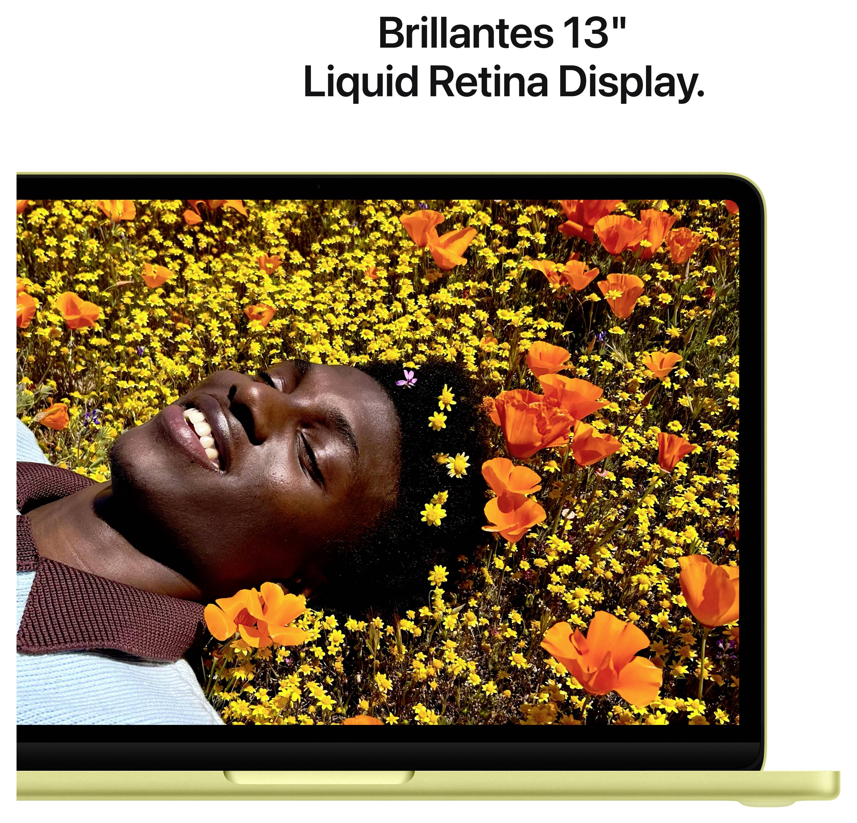 Ein lächelnder Mensch liegt auf einer Wiese voller gelber und orangefarbener Blumen, auf dem Display eines 13-Zoll-Liquid-Retina-Laptops.