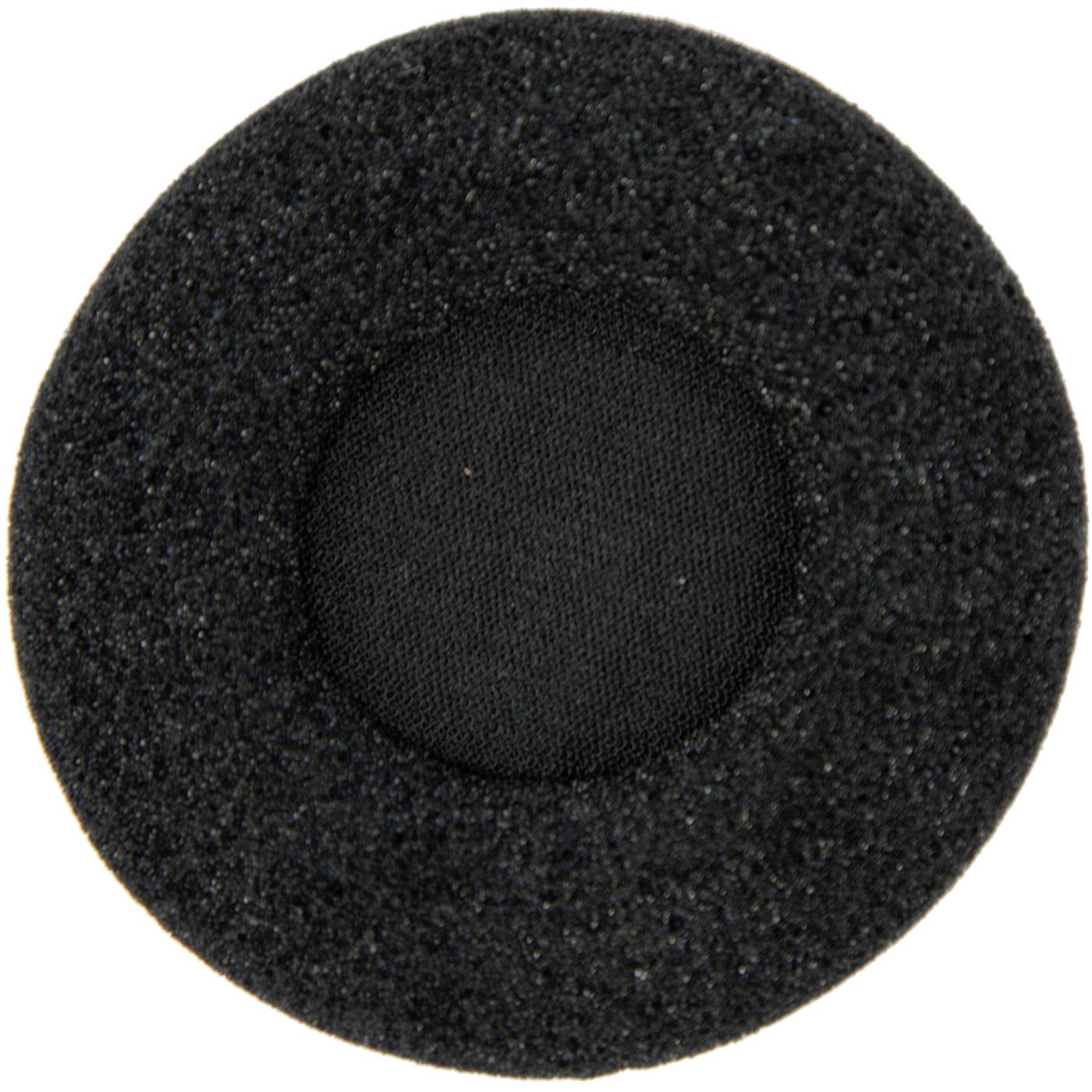 Schwarzes rundes Schaumstoffpad oder Kissen mit strukturiertem äußerem Ring und glatter Mitte auf weißem Hintergrund.