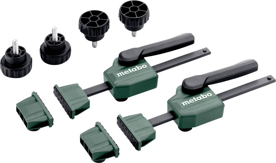 Zwei grüne und schwarze Metabo-Zwingen mit Verstellknöpfen und Spannbacken, die zum Sichern von Materialien bei Holzbearbeitungs- oder Bauaufgaben verwendet werden.