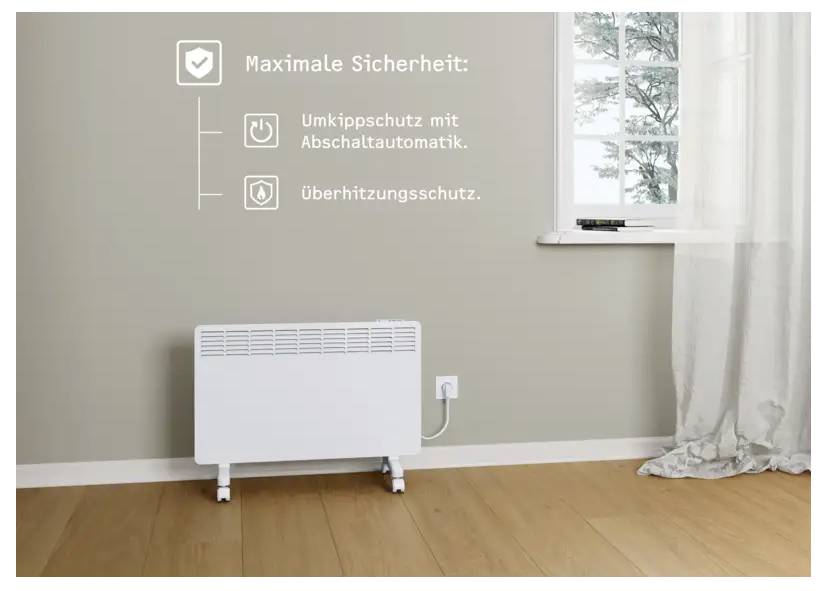 Ein weißer Platzheizer auf einem Holzboden ist in eine Wandsteckdose eingestöpselt; der Text liest sich „Maximale Sicherheit