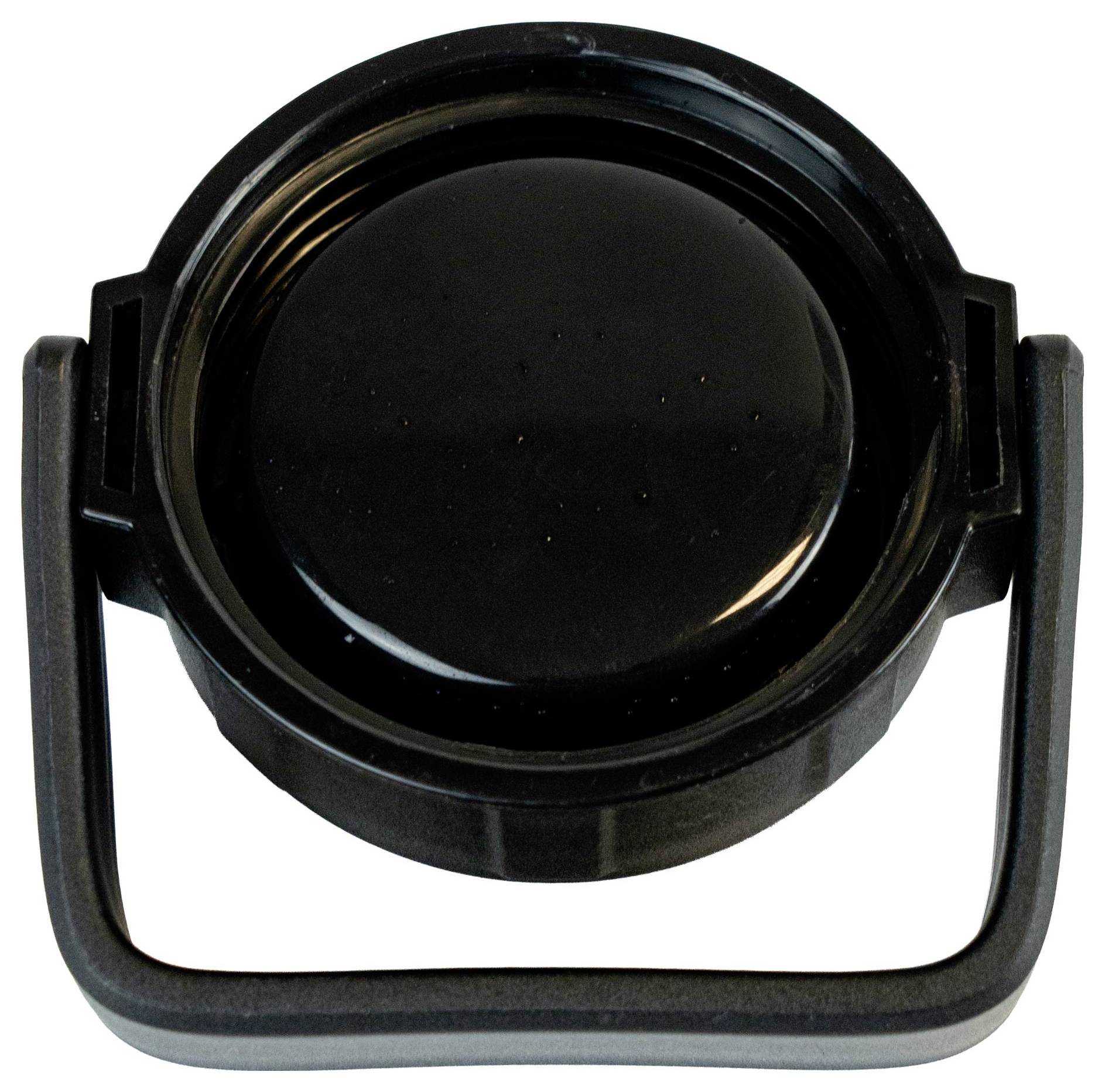 Schwarze Kunststoffkappe mit Griff, von oben betrachtet.