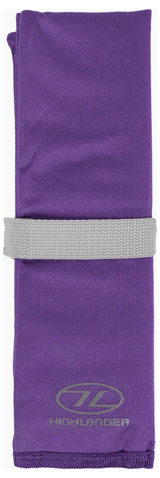 Ein zusammengerolltes Handtuch der Marke Purple Highlander, das mit einem grauen Riemen gesichert ist.