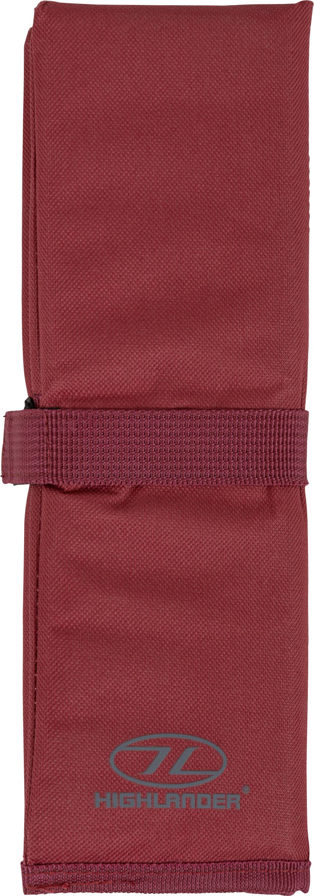 Eine kompakte, gefaltete rote Stofftasche mit einem Riemen und dem Wort 