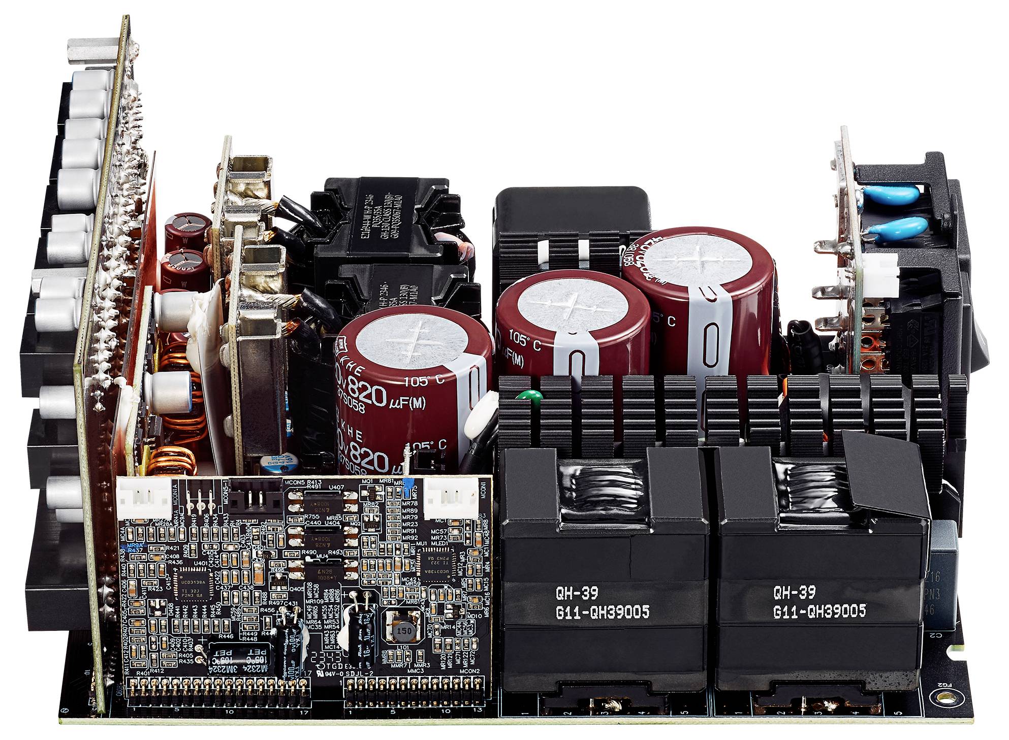 Innenansicht eines elektronischen Geräts mit Kondensatoren, Leiterplatten und Transformatoren, die komplexe elektronische Komponenten hervorheben.