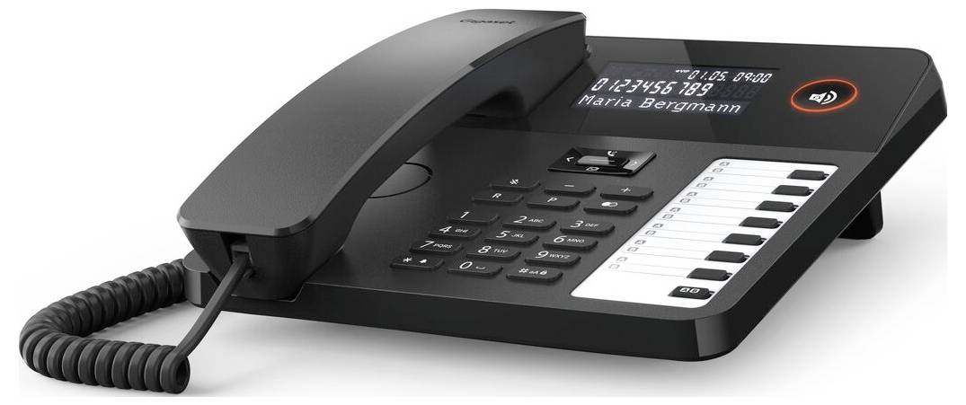 Ein schwarzes Büro-Festnetztelefon mit numerischer Tastatur, digitales Display zeigt eine Telefonnummer und einen Kontaktnamen an, und Spiralschnur.