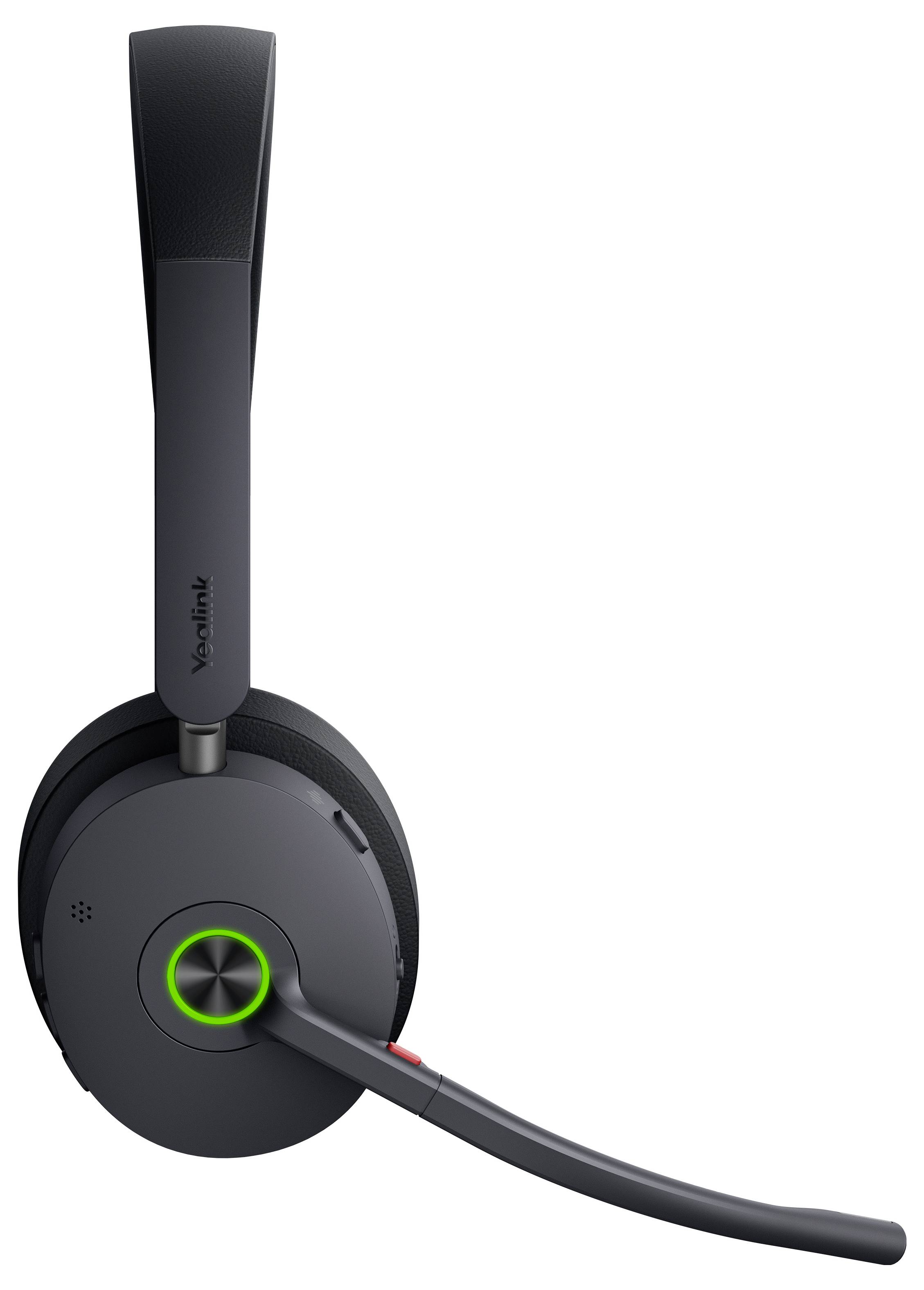 Ein schwarzes kabelloses Over-Ear-Headset mit verstellbarem Mikrofon und einer grünen Leuchtanzeige auf dem Ohrhörer.