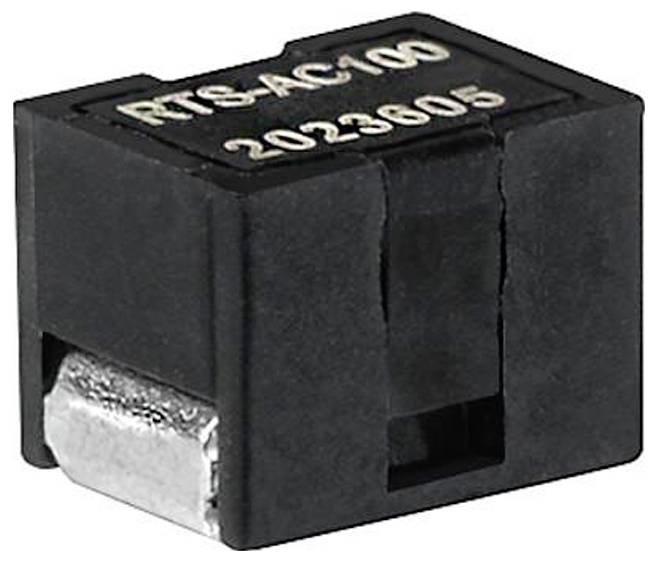 'RTS-AC100 2023605' Komponente, wahrscheinlich ein elektrisches Modul, schwarzes Gehäuse, kleiner Metallstecker sichtbar auf der Seite.