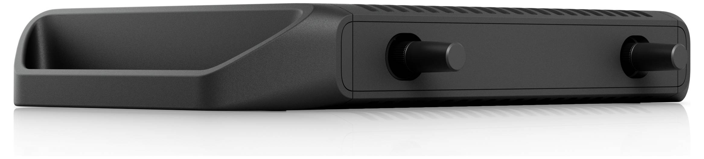 Ein elegantes, schwarzes elektronisches Gerät mit zwei Bedienungsknöpfen und einem Belüftungsschlitz, möglicherweise eine Spielekonsole oder ein Mediaplayer, aus einem flachen Winkel betrachtet.