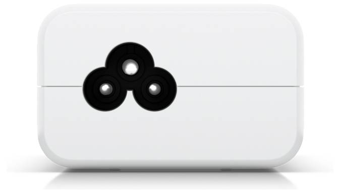 Ein weißes rechteckiges Gerät mit drei kreisförmigen Sensoren, die in einer dreieckigen Anordnung auf der Vorderseite angebracht sind.