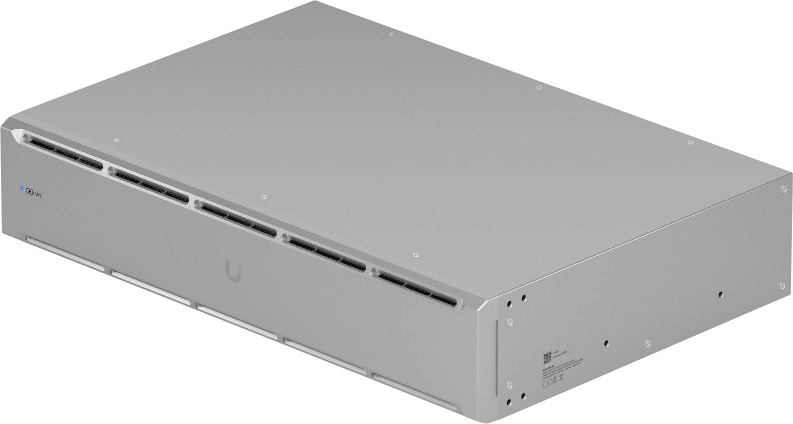 Ein silberner Netzwerk-Switch mit sichtbaren Belüftungsschlitzen und Anschlüssen an der Seite, der für die Netzwerkverbindung in Rechenzentren oder Büros verwendet wird.