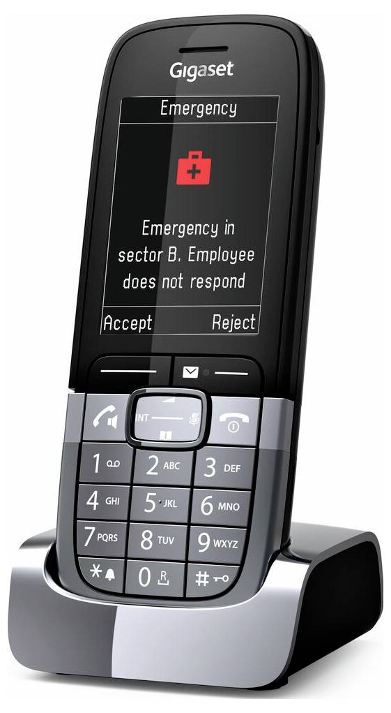 Gigaset Schnurlostelefon in der Ladestation mit Notfallwarnung: „Notfall in Sektor B. Mitarbeiter antwortet nicht