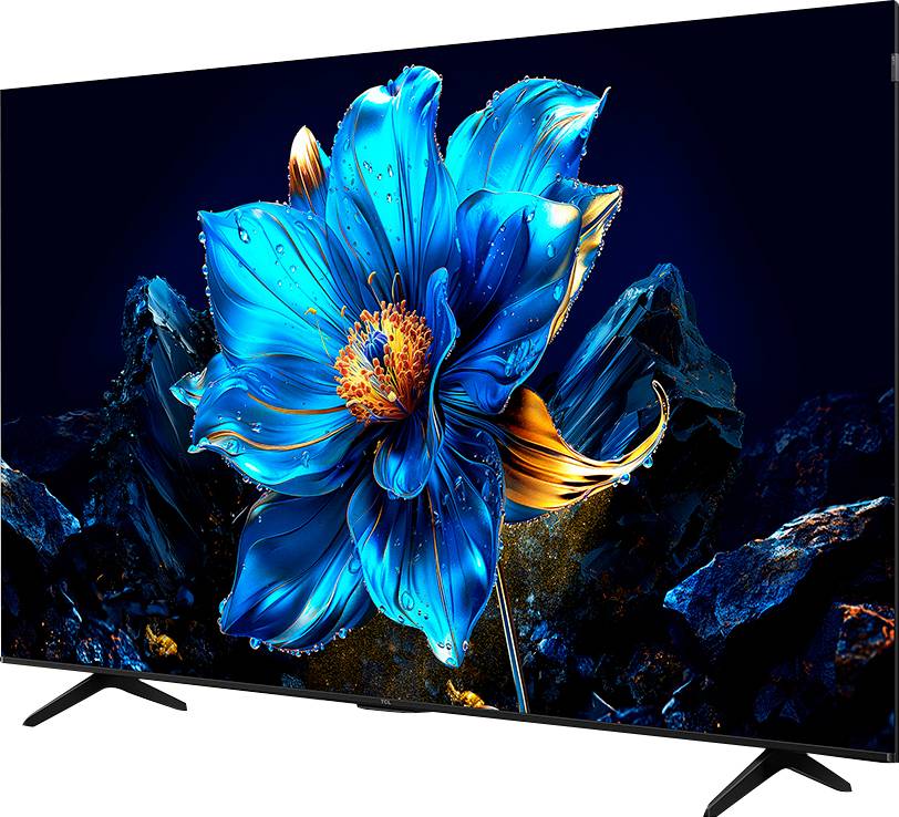 Eine lebhafte blaue Blume mit orangefarbenen Akzenten erscheint vor einem dunklen Hintergrund und erinnert an ein Fernsehbildschirm-Display mit lebendigen Farben.