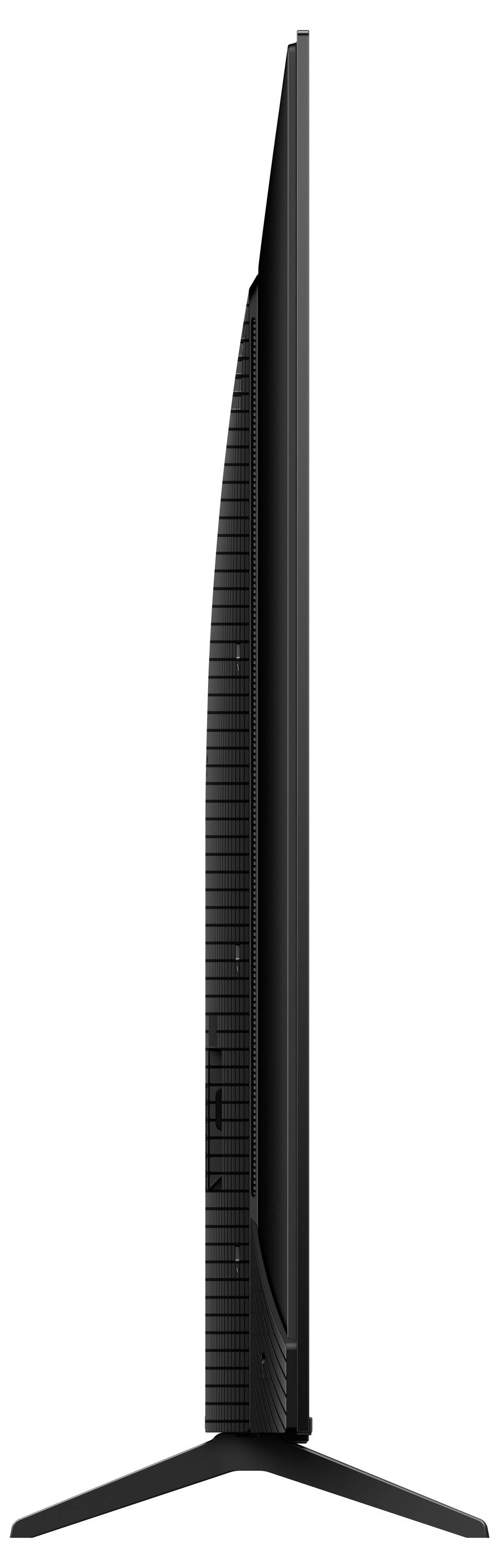 Eine Seitenansicht eines modernen, ultraflachen Fernsehers mit Standfuß, die sein schlankes Design und minimalistischen Stil präsentiert.