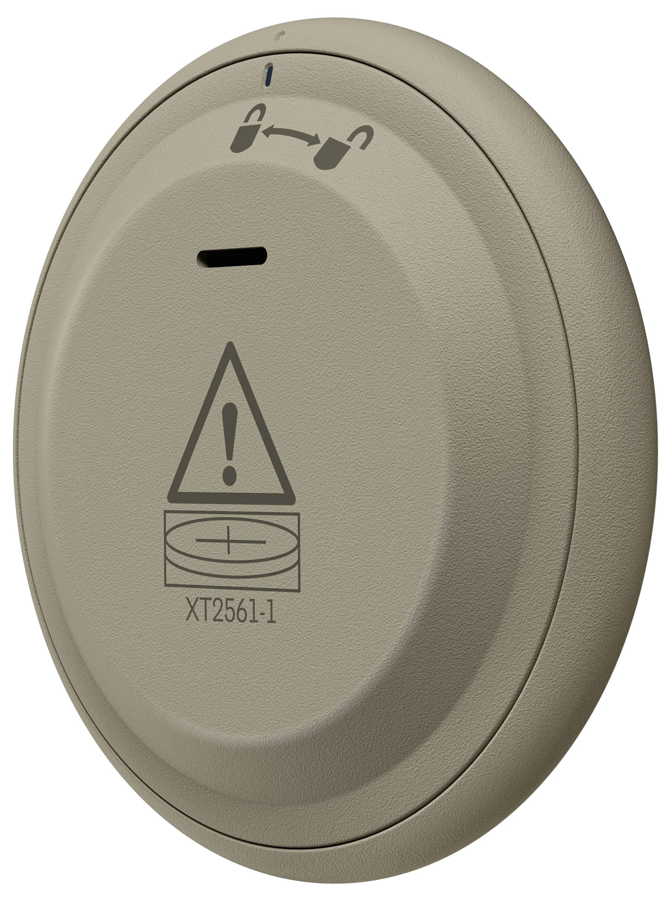 Ein beiger, runder Deckenluftauslass mit Warnsymbol und Modellnummer, mit Richtungsregelung für die Luftströmung.