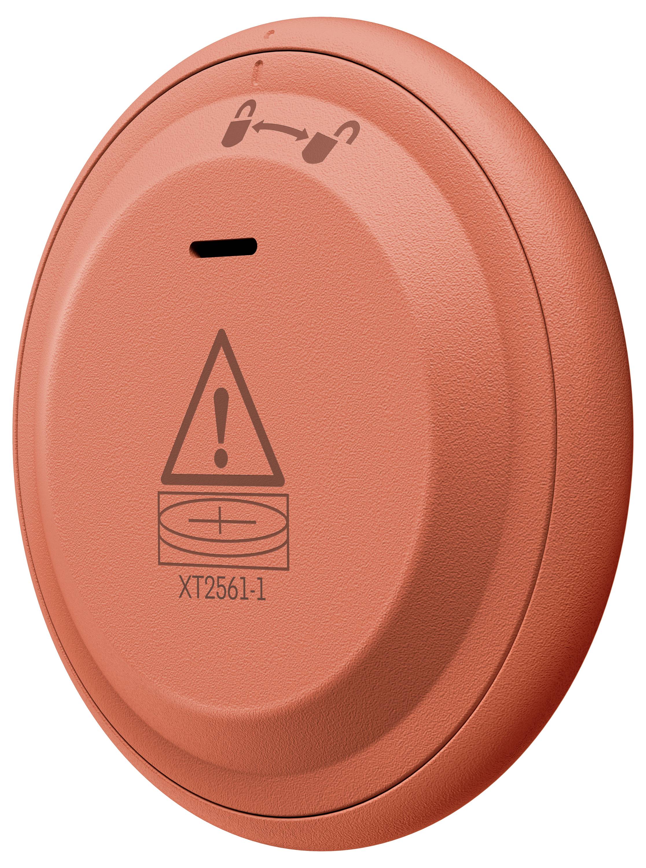 Ein rundes, oranges Gerät mit einem Warndreieck und einem Symbol darüber. Der Code „XT2561-1