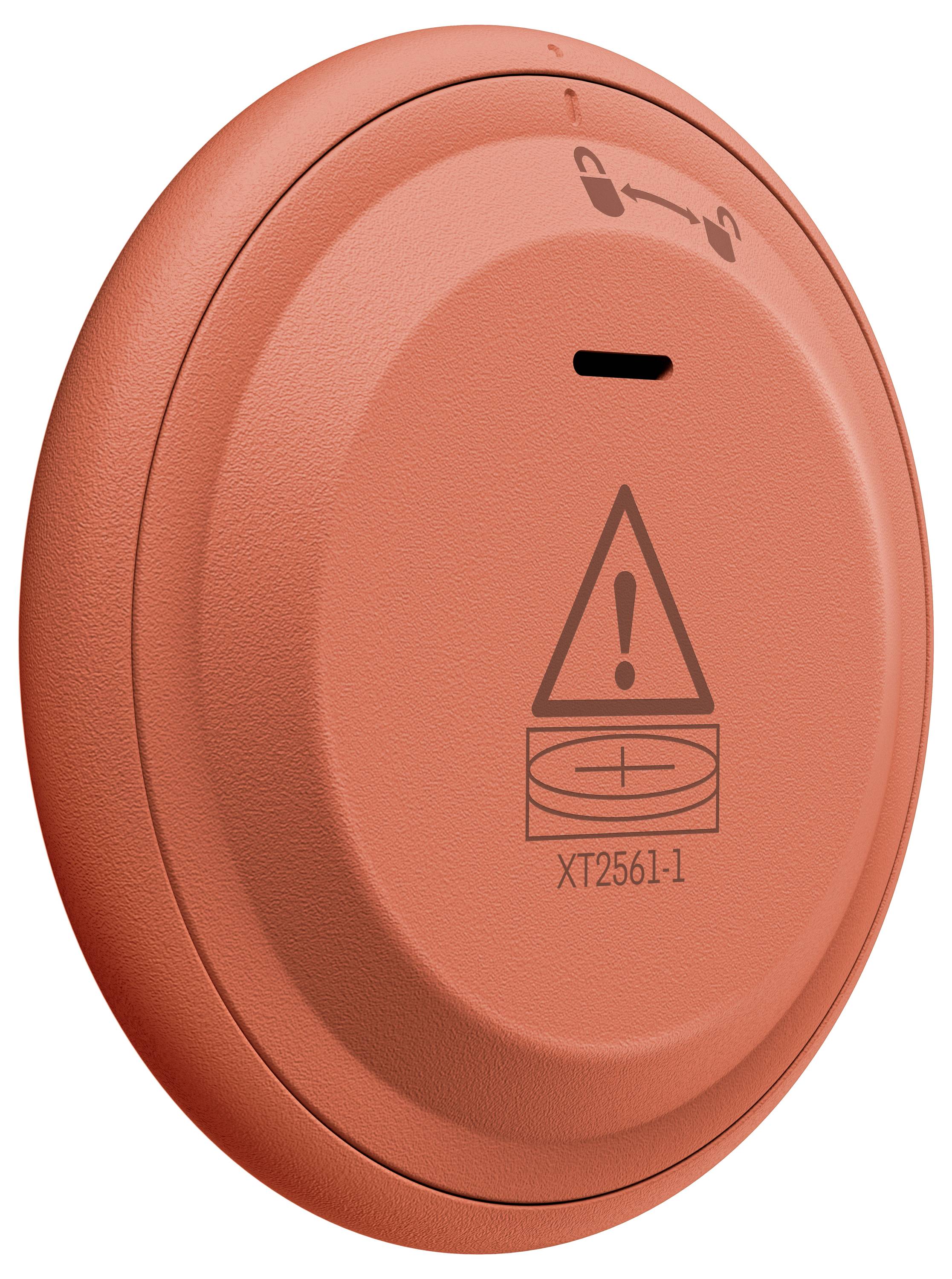 Ein rundes, orangefarbenes Feuermelder mit einem Ausrufezeichensymbol und der Modellnummer „XT2561-1