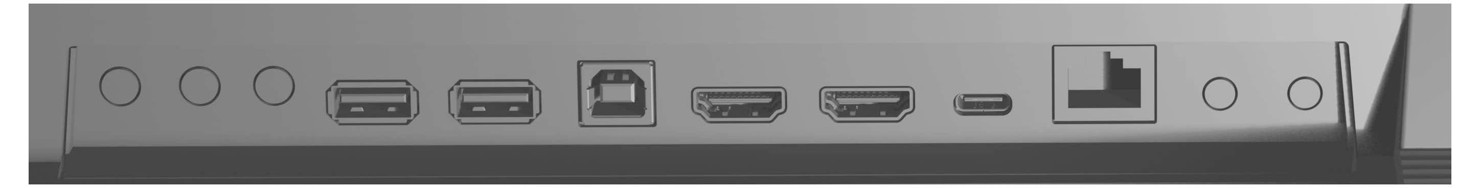 Rückseite eines Geräts mit verschiedenen Anschlüssen: zwei USB-Anschlüsse, zwei HDMI-Anschlüsse, ein Ethernet-Anschluss und ein Stromeingangsanschluss.