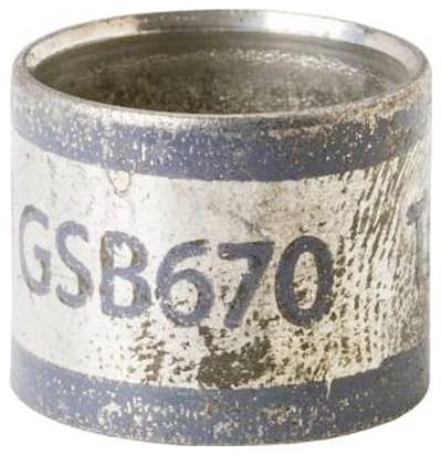 Ein Metallzylinder mit abgenutztem, verblasstem Text „GSB670