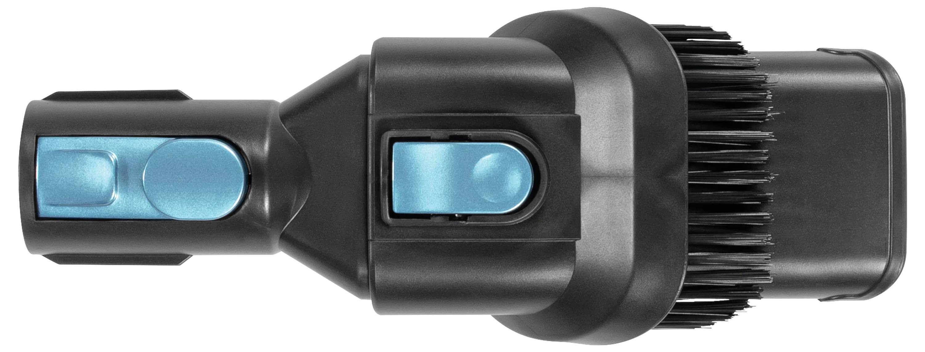 Ein Staubsaugeraufsatz mit schwarzen Borsten und einem blauen Knopf, der zum Reinigen von Oberflächen verwendet wird.