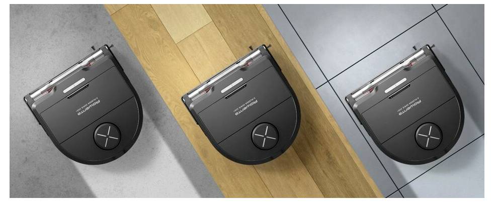 Roboterstaubsauger reinigt drei verschiedene Bodentypen: Teppich, Holz und Fliesen und demonstriert Vielseitigkeit und Anpassungsfähigkeit.