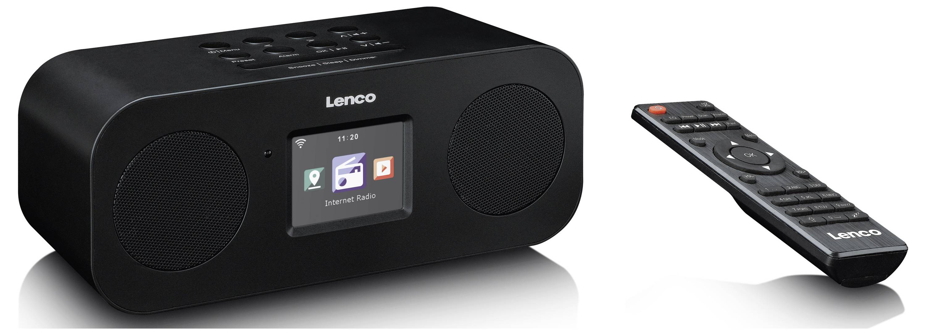 Ein Metallbügel mit Schelle sichert ein schwarzes zylindrisches Rohr an einer beigen Wand und zeigt eine Montagelösung zur Stabilisierung von Rohren.