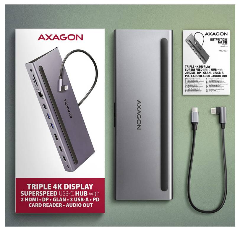 AXAGON Triple 4K Display SuperSpeed USB-C Hub, dargestellt mit Verpackung, Hub-Gerät, Bedienungsanleitung und USB-C-Kabel auf grünem Hintergrund.