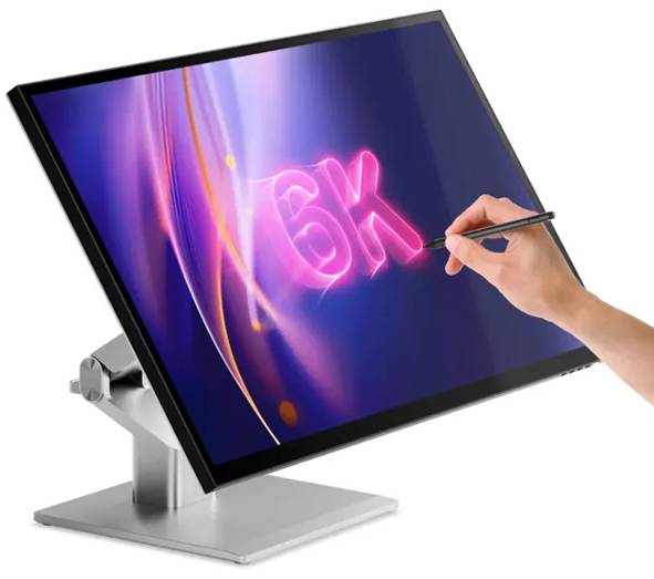 Eine Hand verwendet einen Stift auf einem geneigten Touchscreen-Display, das leuchtenden rosa 