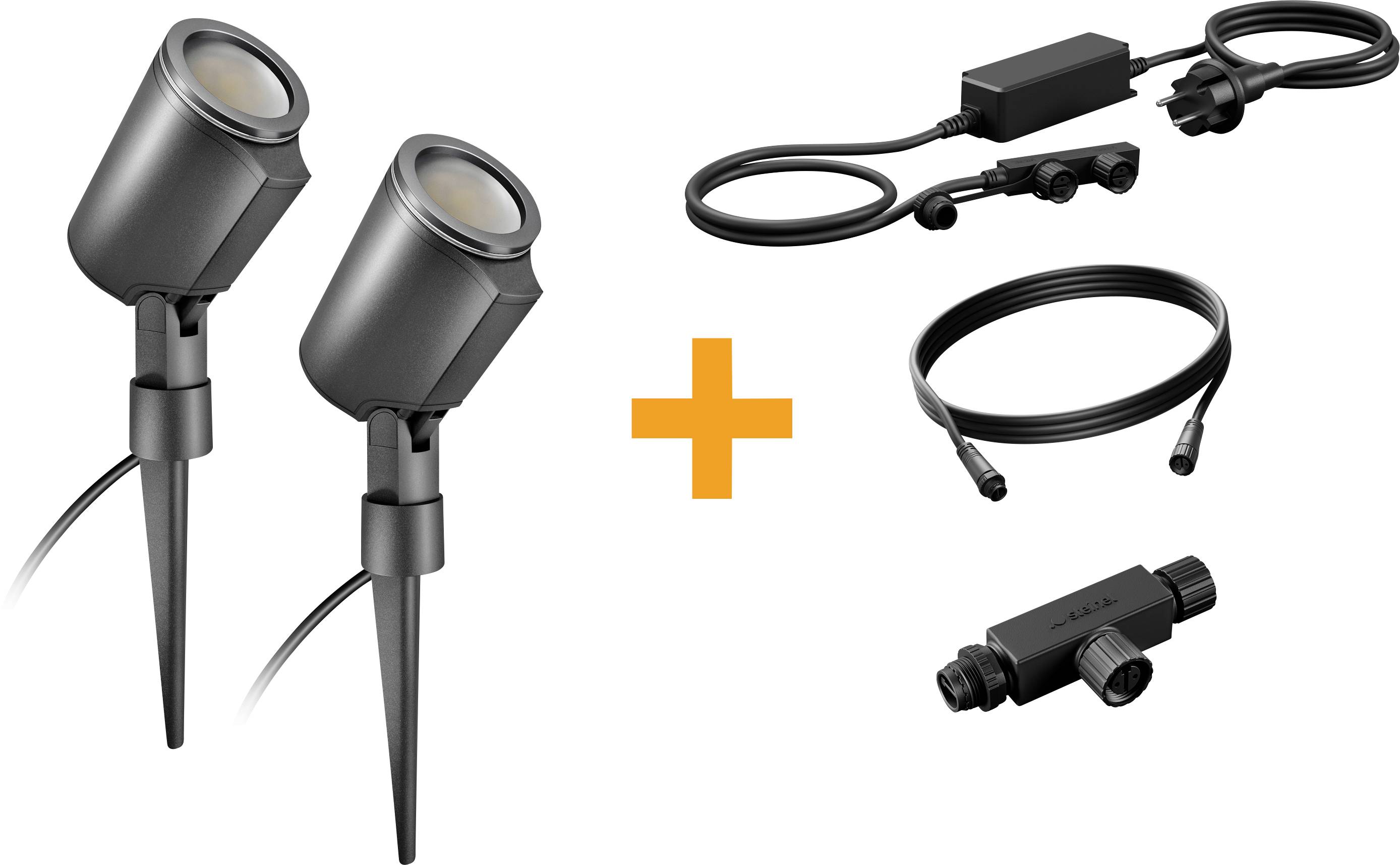 Zwei schwarze Landschaftsleuchten mit mitgeliefertem Stromkabel, Verlängerungskabel, Splitter und Stecker, dargestellt als Beleuchtungsset.