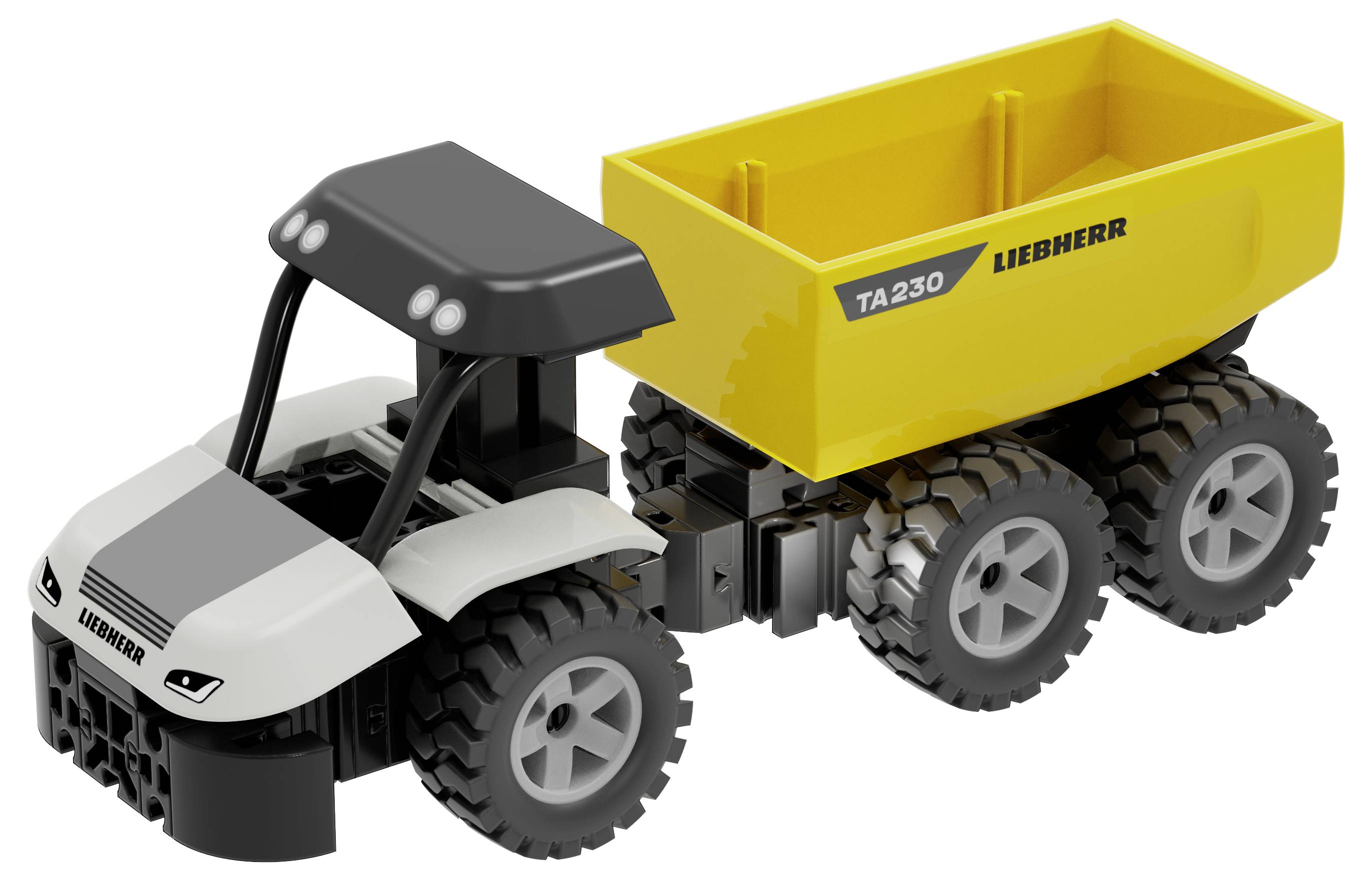 Ein Spielzeug-Liebherr-Muldenkipper mit weißer Kabine, schwarzem Dach und gelbem Kippmulde mit der Beschriftung „TA230