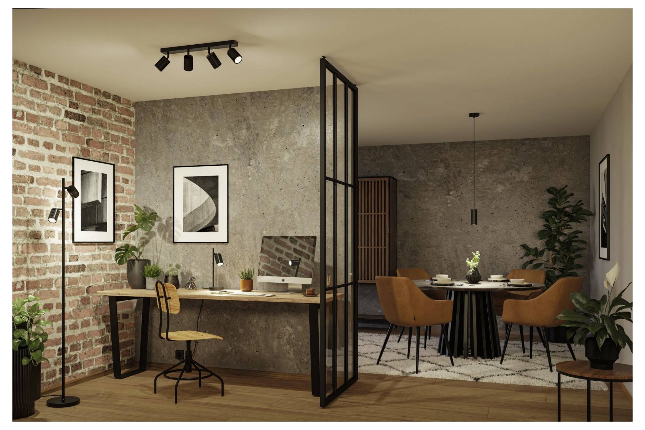 Offene Loft-Inneneinrichtung mit einem Schreibtisch auf der linken Seite und Esstisch auf der rechten Seite, getrennt durch eine Glastrennwand, mit freigelegten Backstein- und Betonwänden.