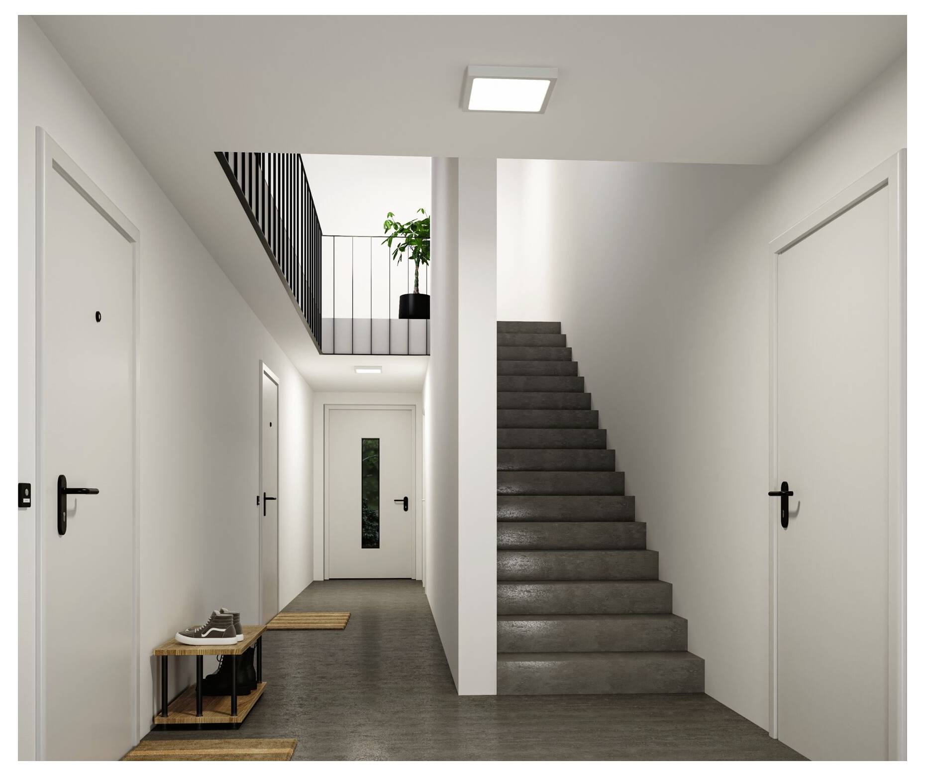 Moderner minimalistischer Flur mit mehreren weißen Türen, einer zentralen Treppe und einem kleinen Eingangstisch sowie einer Pflanze, fotografiert aus dem Korridor.