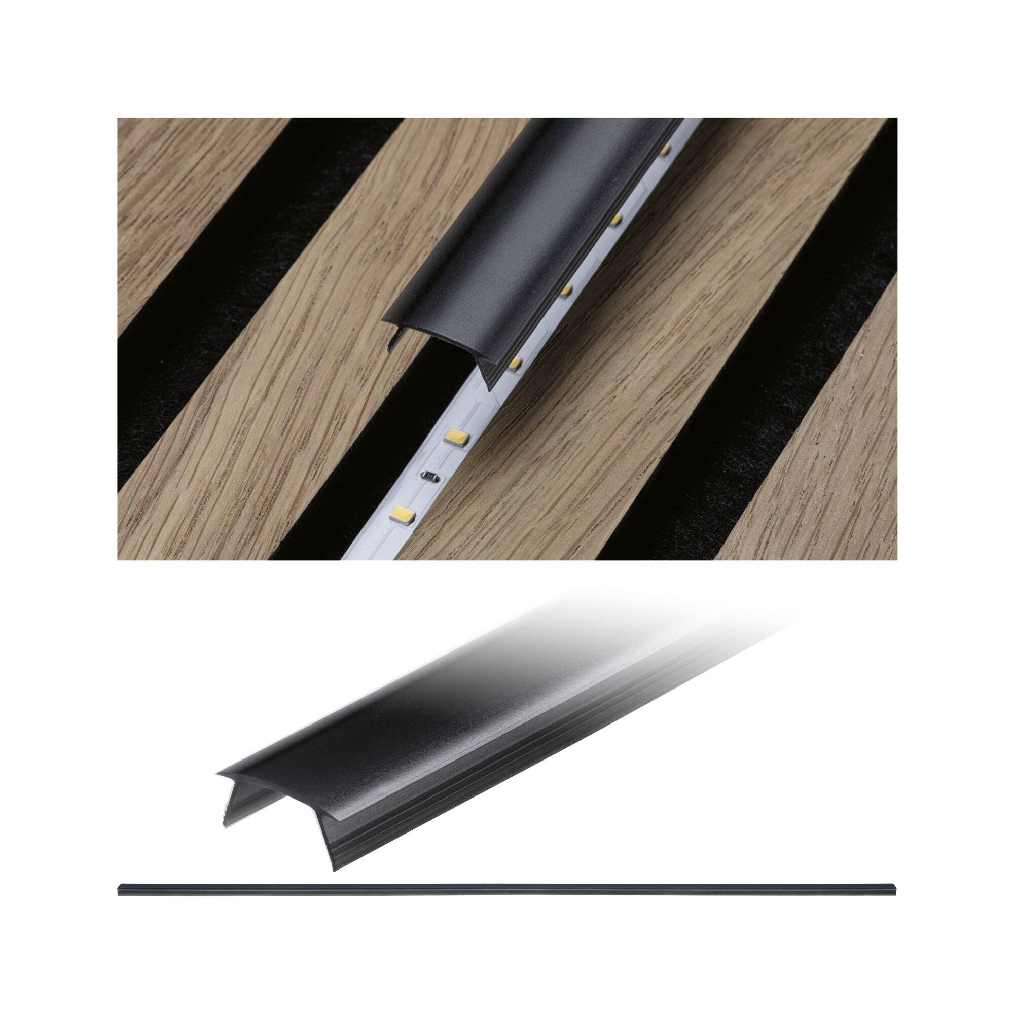 Übergangsprofil aus schwarzem Metall und silbernem Boden, das zwischen Holzdielen installiert ist, mit separater Produktansicht unten.