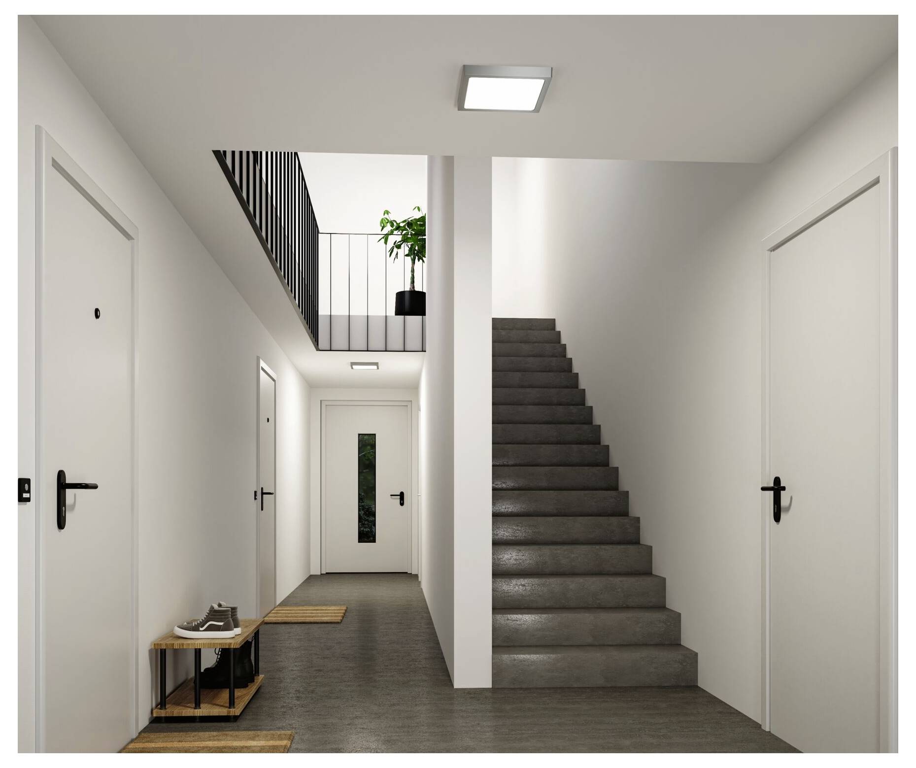 Moderner Apartmenthur mit weißen Türen, einer Treppe auf der rechten Seite und einem kleinen oberen Treppenabsatz mit einer Topfpflanze.