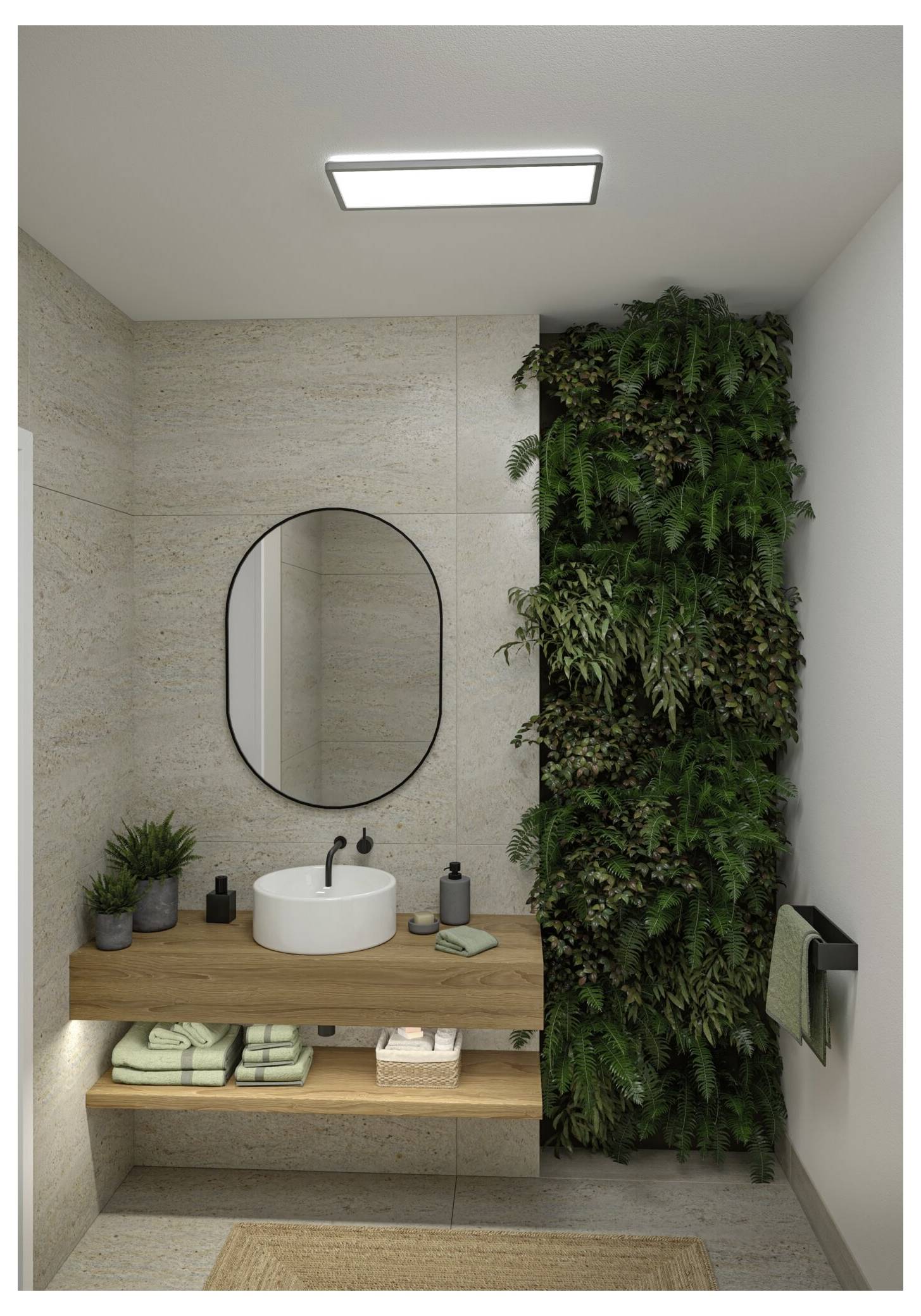 Modernes Badezimmer mit schwebendem Holzwaschtisch, ovalem Spiegel, rundem Waschbecken, Handtüchern und einer vertikalen grünen Pflanzenwand neben dem Duschbereich.