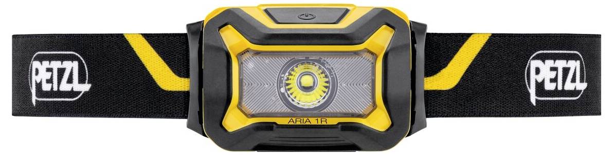 Nahaufnahme einer violetten schnurgebundenen Computermaus mit gelbem Logo und orangefarbener Seitenakzentuierung, shown in Profilansicht auf weißem Hintergrund.