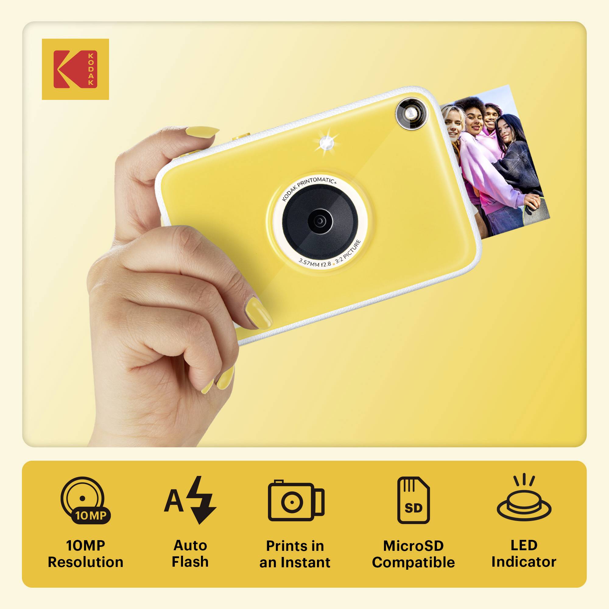 Hand hält eine gelbe Kodak Sofortbildkamera mit austretendem Foto; Icons am unteren Rand zeigen 10MP, Blitzautomatik, Sofortdruck, MicroSD-Kompatibilität und LED-Anzeige.