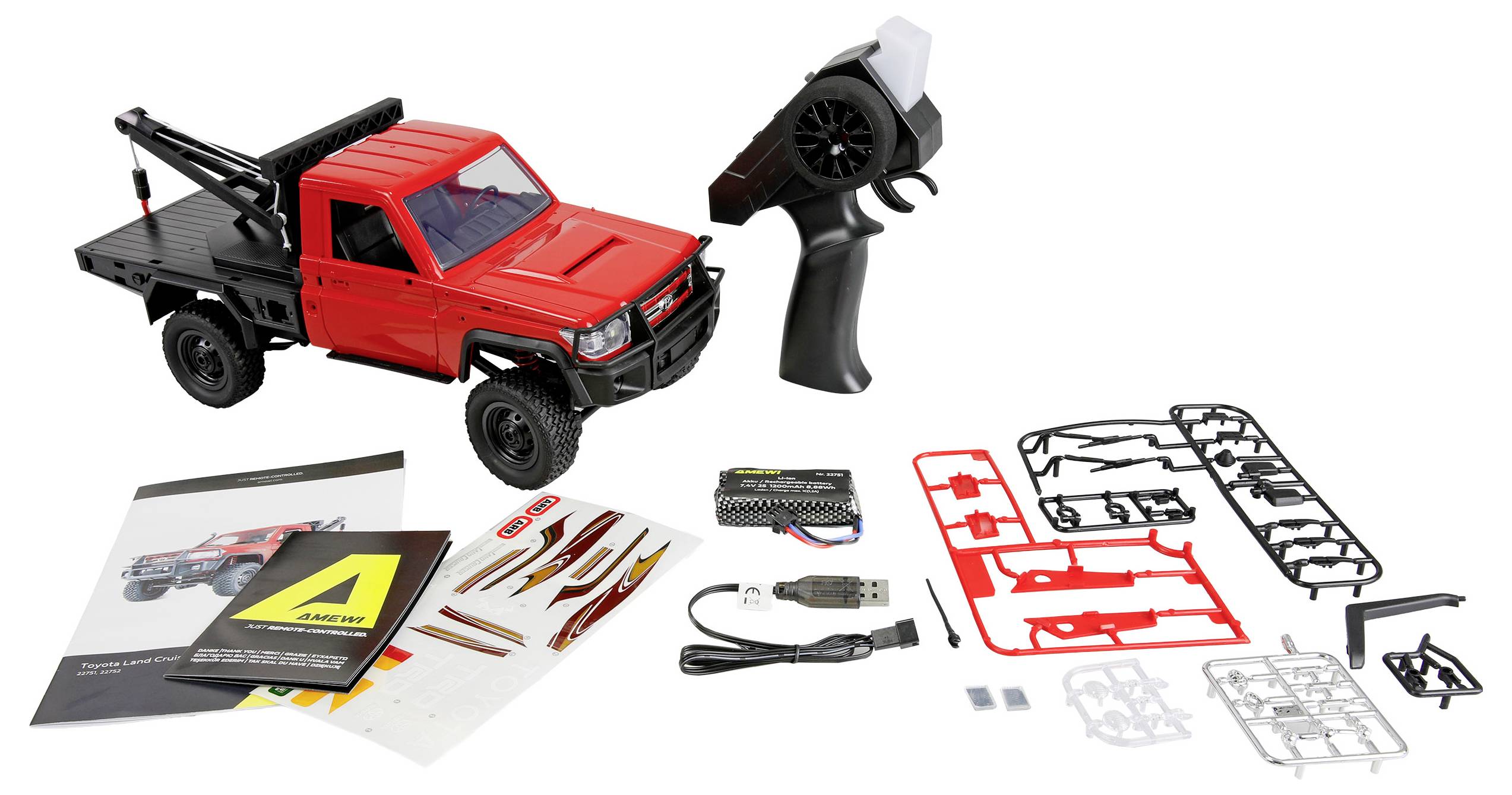 Rotes RC-Lkw-Modellbausatz mit Fernsteuerung, Bedienungsanleitung, Batterien, USB-Kabel und Montageteilen, die zum Zusammenbau und zur Steuerung ausgelegt sind.