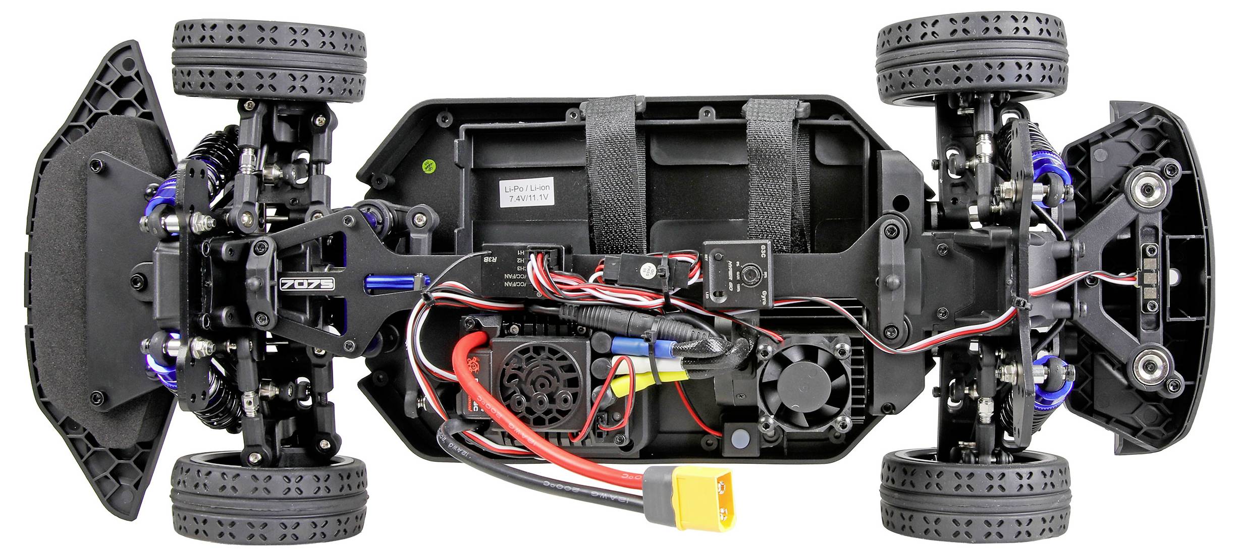 Draufsicht auf ein ferngesteuertes Geländewagen-Fahrgestell mit freiliegender Batterie, Verkabelung, Motoren, Federung und vier Geländereifen.