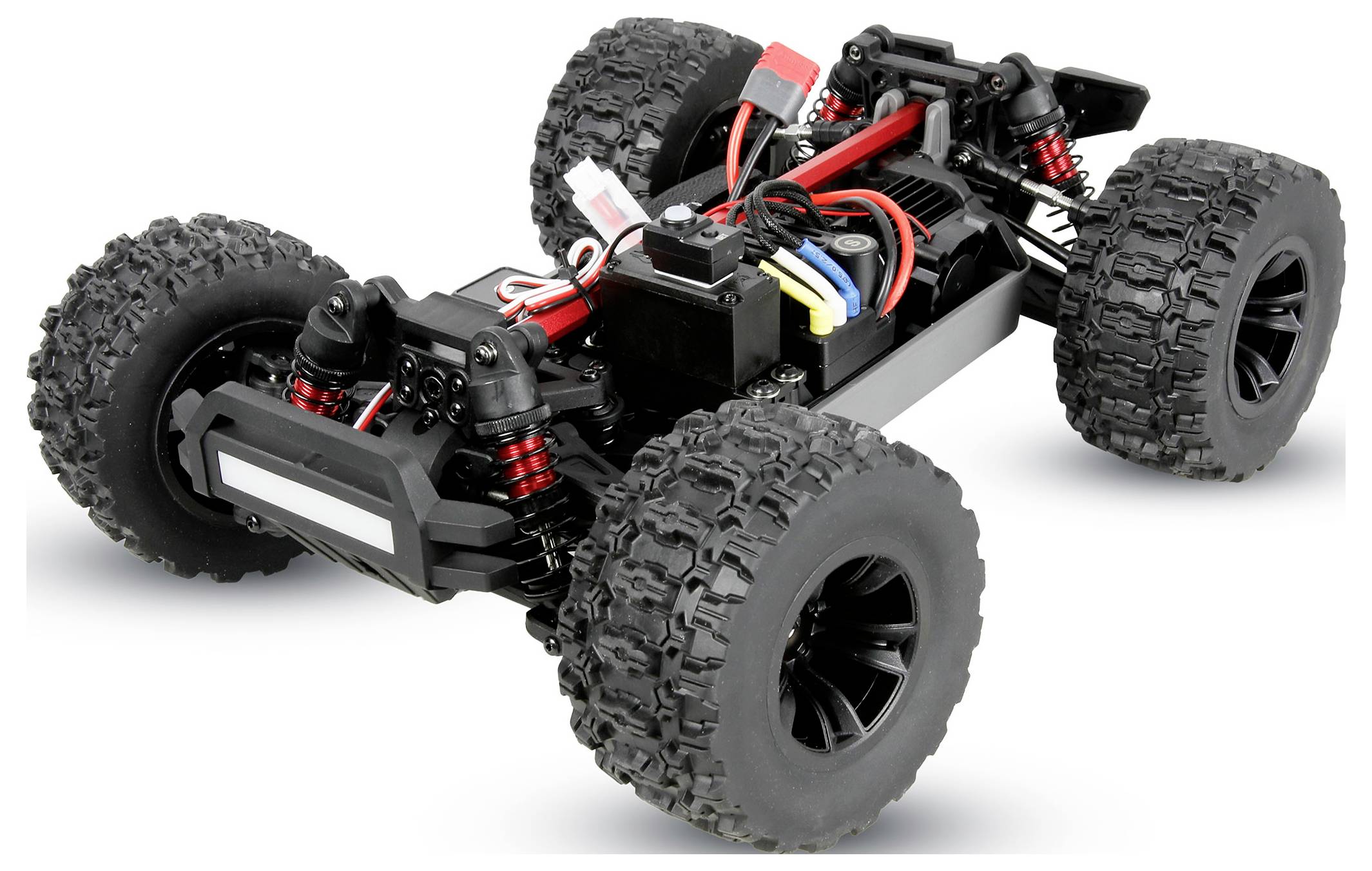 Ferngesteuertes Gelände-Buggy-Chassis mit vier großen Stollenreifen und freiliegender Aufhängung, gezeigt auf weißem Hintergrund.