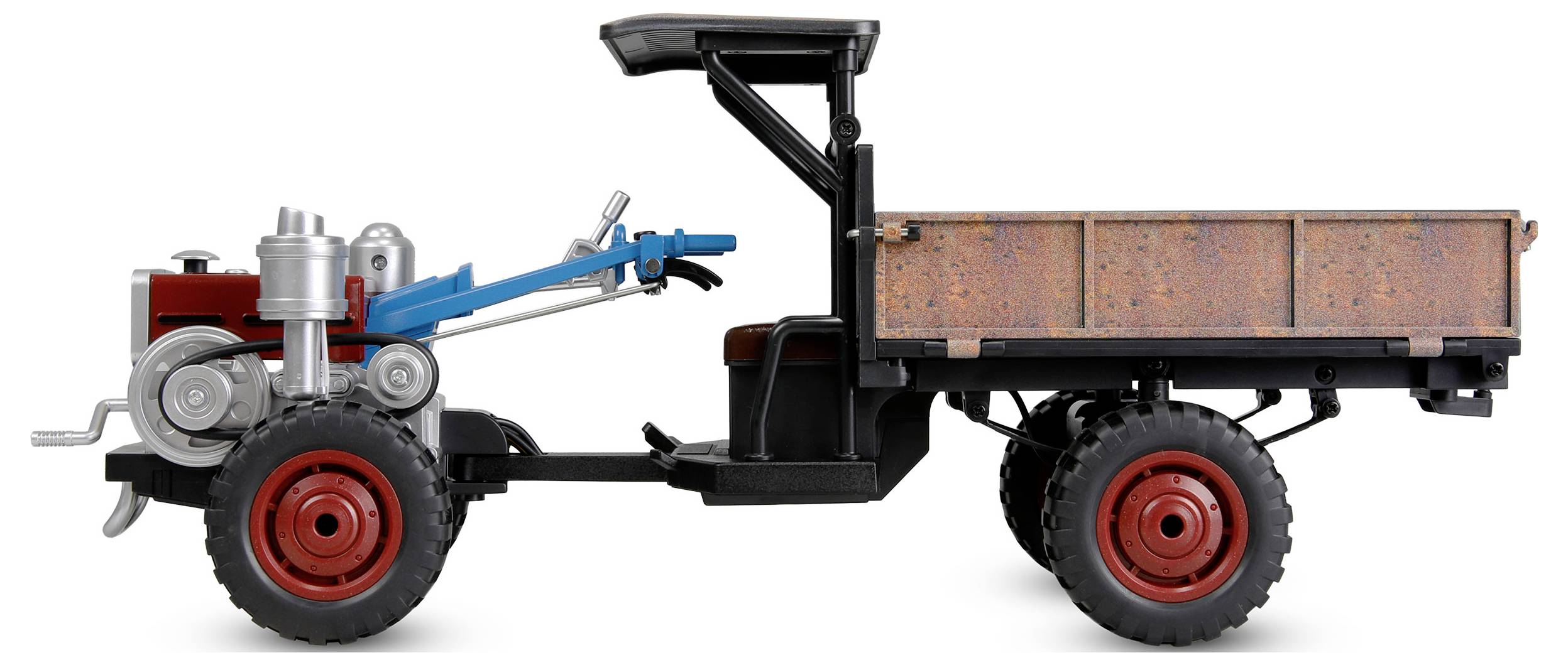 Seitenansicht eines kleinen Nutzanhänger-Traktors oder motorisierten Transporters mit einer Ladefläche, dargestellt vor weißem Hintergrund.