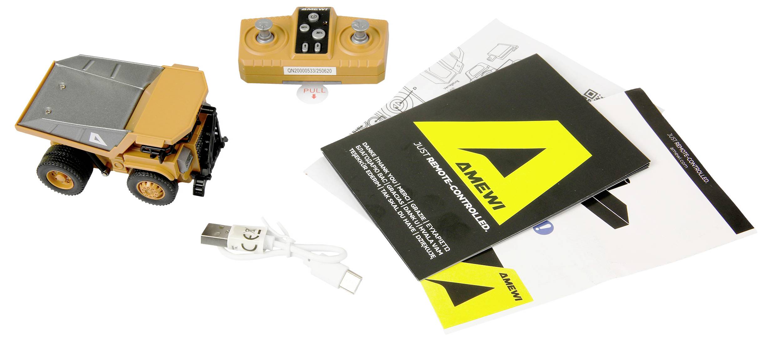 Inhalt des Aview elektronischen Bausatzes: Spielzeug-Kipplaster, tragbarer Controller, USB-Kabel, Bedienungsanleitungen und Aufkleber auf weißem Hintergrund.