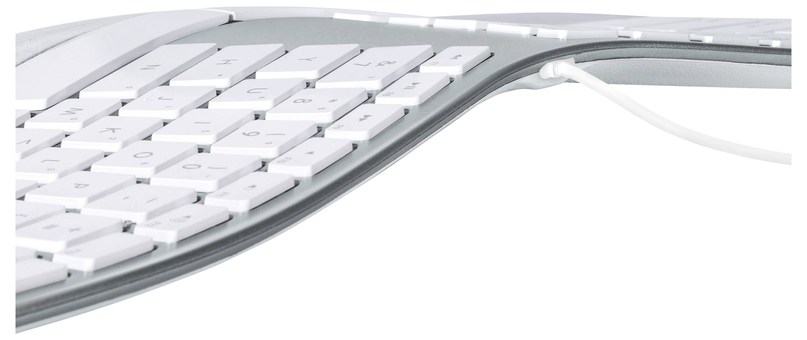 Nahaufnahme einer schlanken weißen Computertastatur mit geschwungener Metalloptik und einem sichtbaren Kabel auf schlicht strukturiertem Hintergrund.