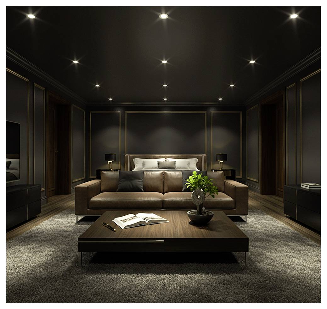 Modernes Schlafzimmer mit braunem Lederssofa, Couchtisch mit aufgeschlagenem Buch, Bett im Hintergrund und gedimmter Einbauleuchten in einem dunklen, eleganten Interieur.