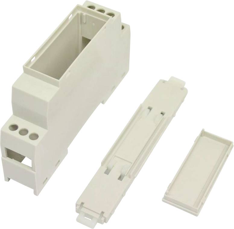 Drei cremefarbene Gehäuse oder Abdeckungen von Elektrogeräten, getrennt auf weißem Hintergrund dargestellt.