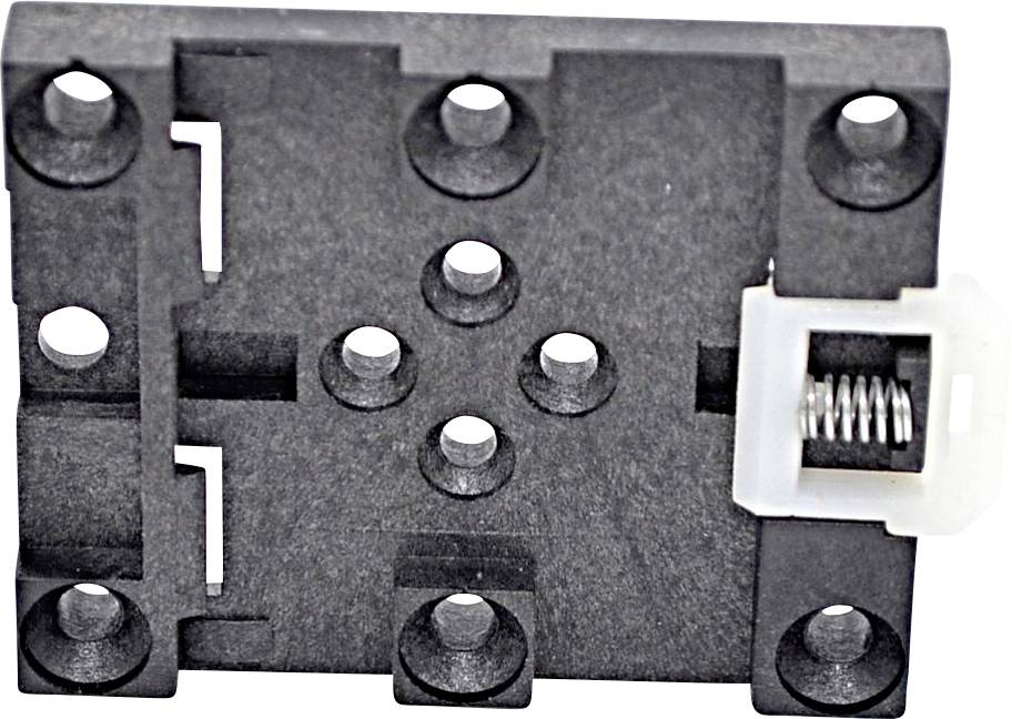 Nahaufnahme eines kleinen schwarzen elektronischen Schalters oder Sensormoduls mit Befestigungslöchern und einem weißen federbelasteten Stecker auf der rechten Seite.