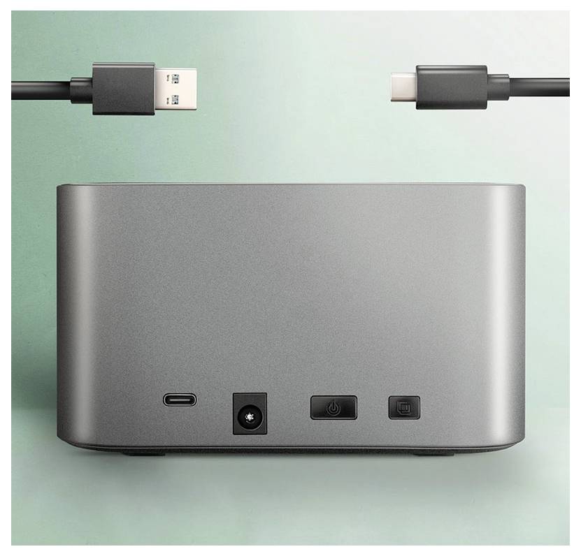 Silberne Dockingstation mit USB-C- und USB-A-Kabeln oben abgebildet, mit vorderen Anschlüssen und Netztaste auf mintgrünem Hintergrund.