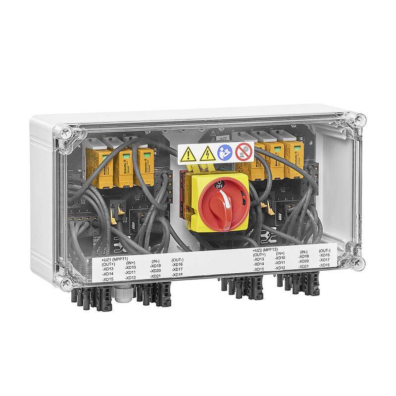 Transparentes elektrisches Steuergehäuse mit orangefarbenen Modulen, Verdrahtung und einem großen rot/gelben Drehtrennschalter mit der Beschriftung Aus/Ein.